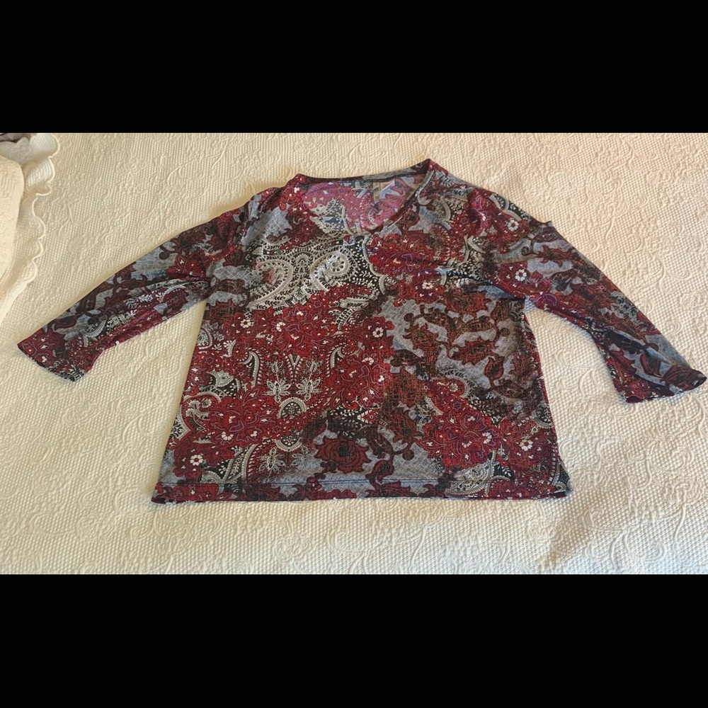 White stag, women’s medium, color is a deep red.